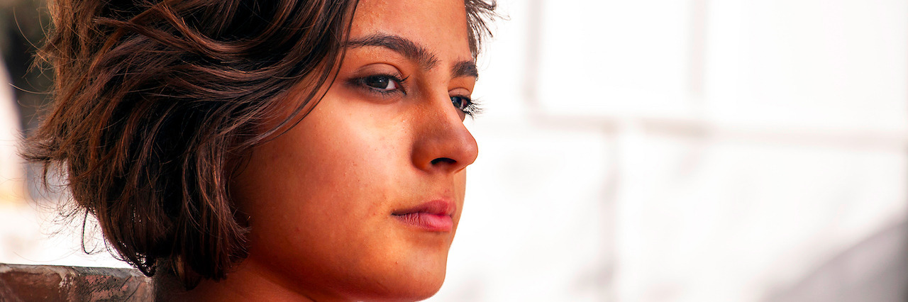 Learning to Take Care of Yourself in Eating Disorder Recovery There are thoughtful young lady. Young woman is thinking.