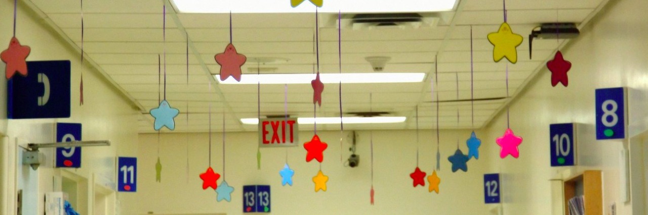 I’m 32 and Still See a Doctor at a Children’s Hospital stars hanging from the ceiling of a children's hospital