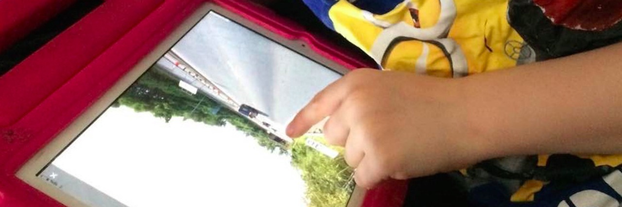 Autism: How Son Uses Google Street View Maps to Communicate Boy using Google Street Maps view on iPad
