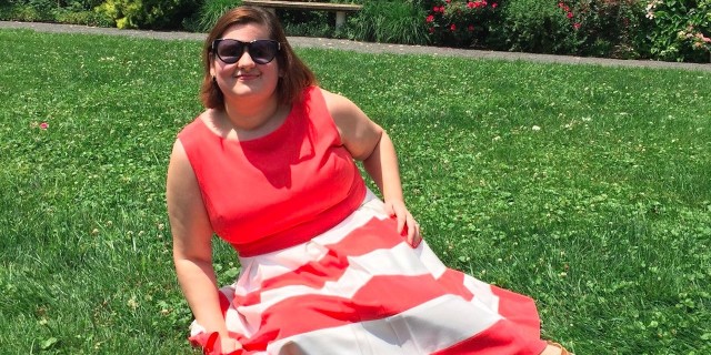 Adapting to Life With Blindness After My Childhood Cancer Battle woman in red and white dress sitting on grass lawn