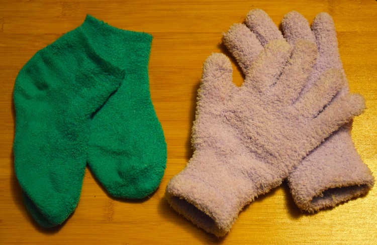 green fuzzy socks and pink fuzzy gloves