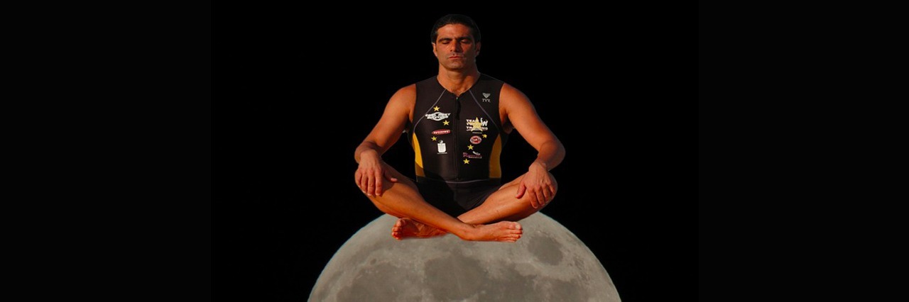 a photo of the author's husband sitting on a moon