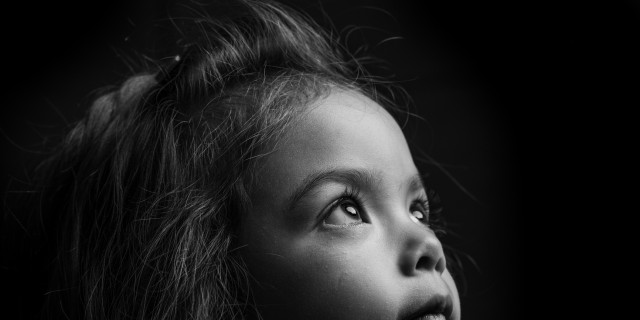 Little Girl Looking Up