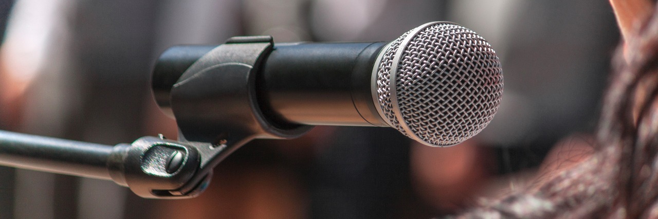 close up of microphone at a conference meeting