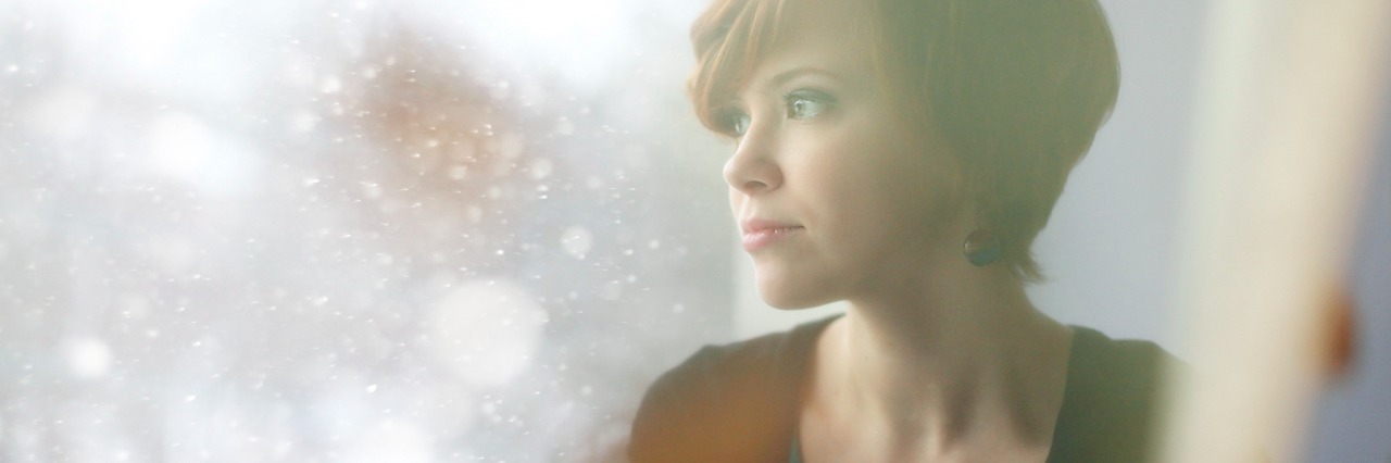 To the Woman Who Told Me Not to Gain Weight sad girl looking out the window