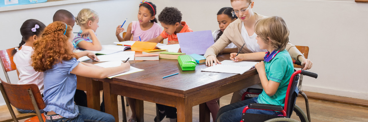 Letter to the Only Child in School Who Uses a Wheelchair Girl in a wheelchair at school.