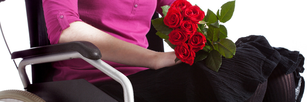 Dating With Cerebral Palsy Woman in a wheelchair with roses.