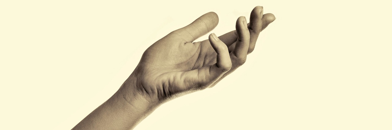 I'm an Adult Who Self-Harms woman's hand pointing up