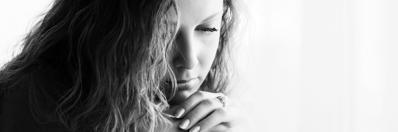 Asking for Help After You Relapse Into Bulimia Sad beautiful woman with long curly hairs