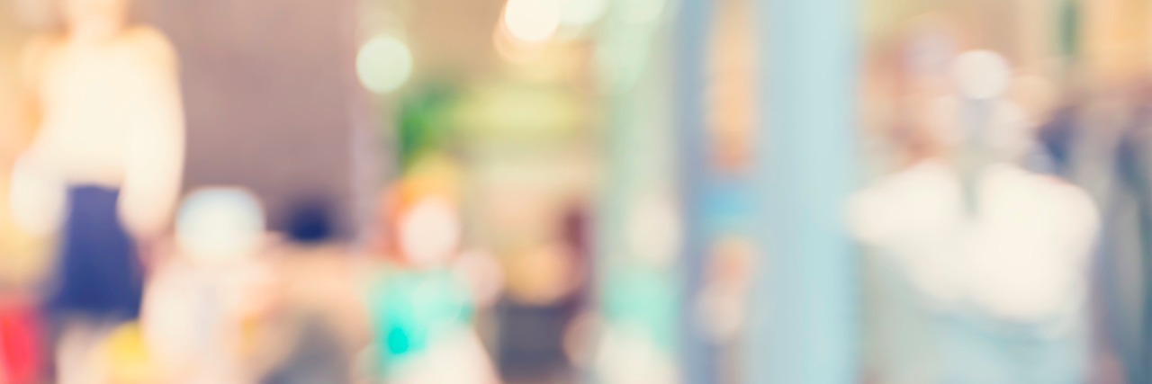 How My Husband Helped Reduce My Anxiety While Shopping Blurred clothing store front displaying woman's fashion