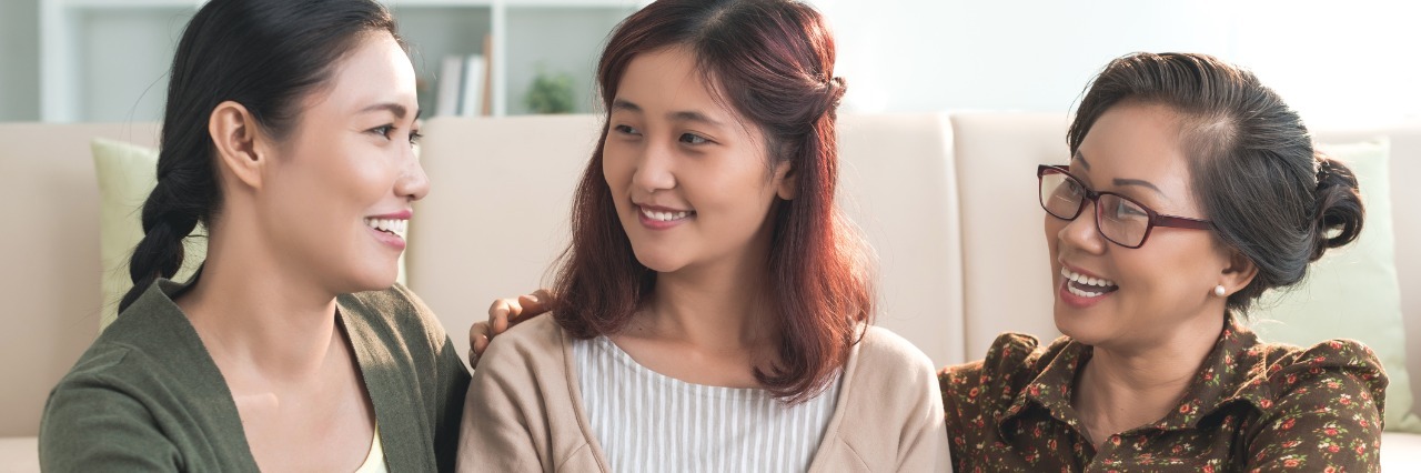 Talking About Lupus and Chronic Illness in Conversations three friends talking and sitting on a couch