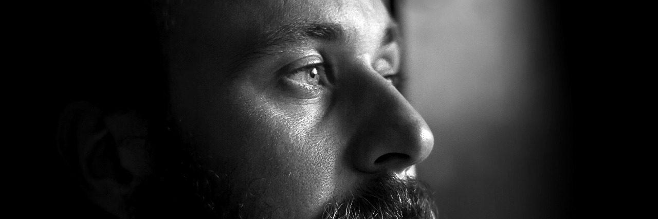 8 Things I've Learned From Having Schizoaffective Disorder Black and white portrait of a serious man, side view