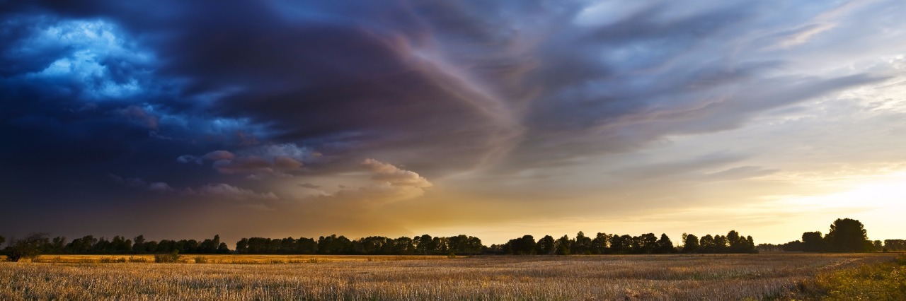 After the Storm of Depression Sunset. Dark clouds coming from the south announce the weather change, possible storm.