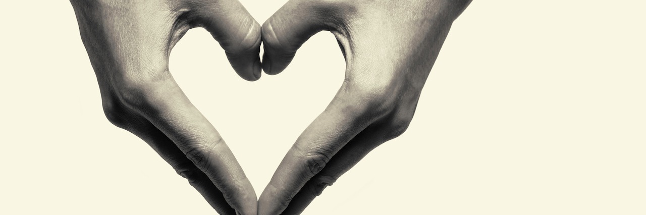 What You Should Know If You're Thinking of Self-Harming Two hands portraying heart