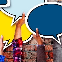 Group of hands holding speech bubbles