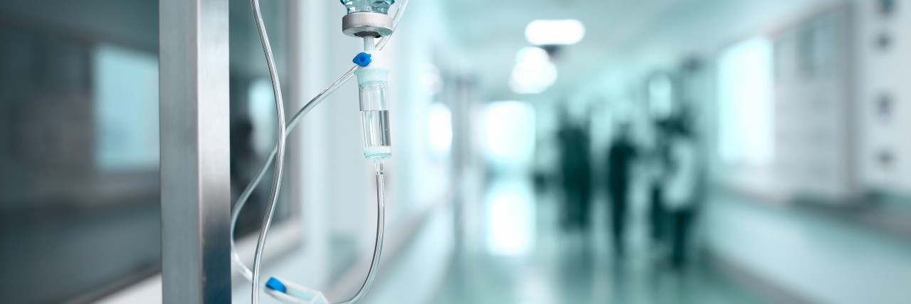 Shopping Tips for Someone With Chronic Health Conditions Drip On The Background A Hospital Corridor