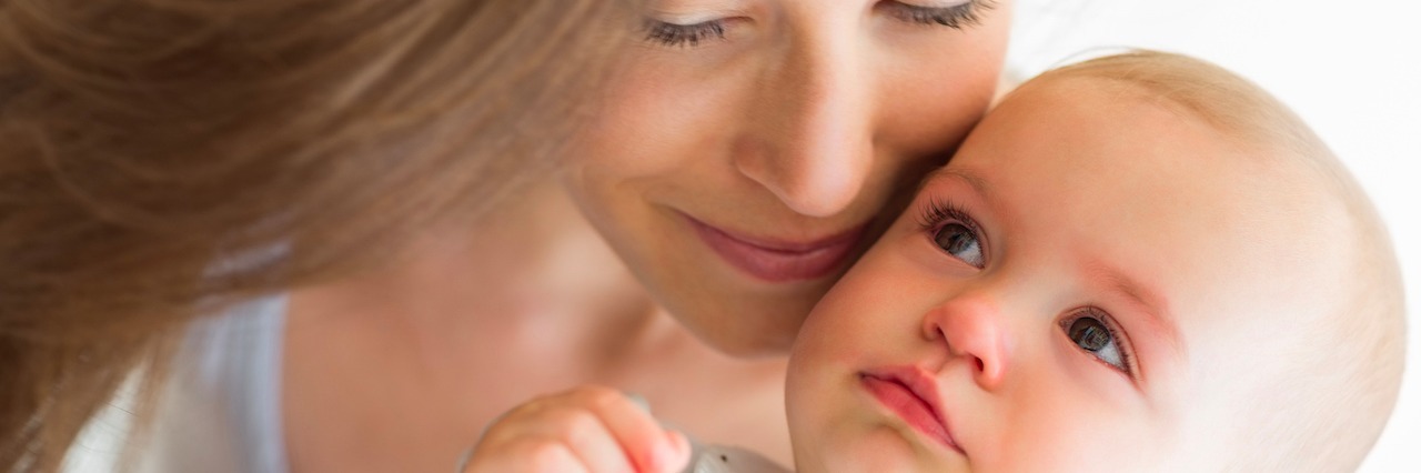When Anxiety Makes You Feel Like a Bad Mom Closeup of a smiling mother and baby