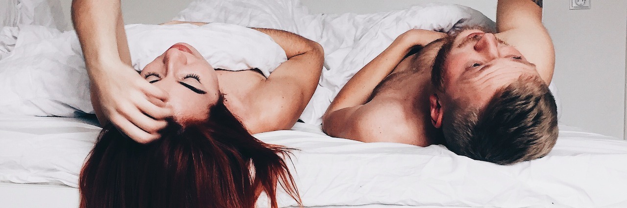 What It's Like to Be in Love When You Have Depression couple lying together on the bed