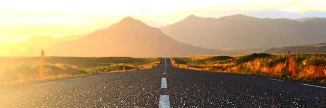 Mental Health Recovery: 5 Tips to Get Back on Track After a Crisis an open road leading to mountains