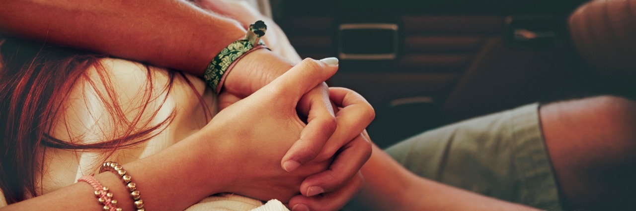 affectionate young couple on a road trip