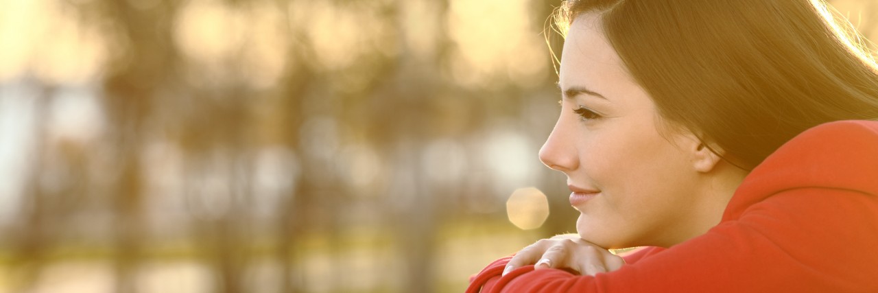 Pensive girl thinking in winter