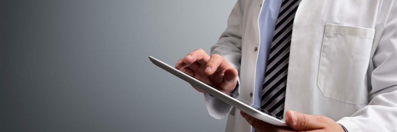 When a Doctor Dismissing Your Pain Because You're Overweight doctor with a clipboard