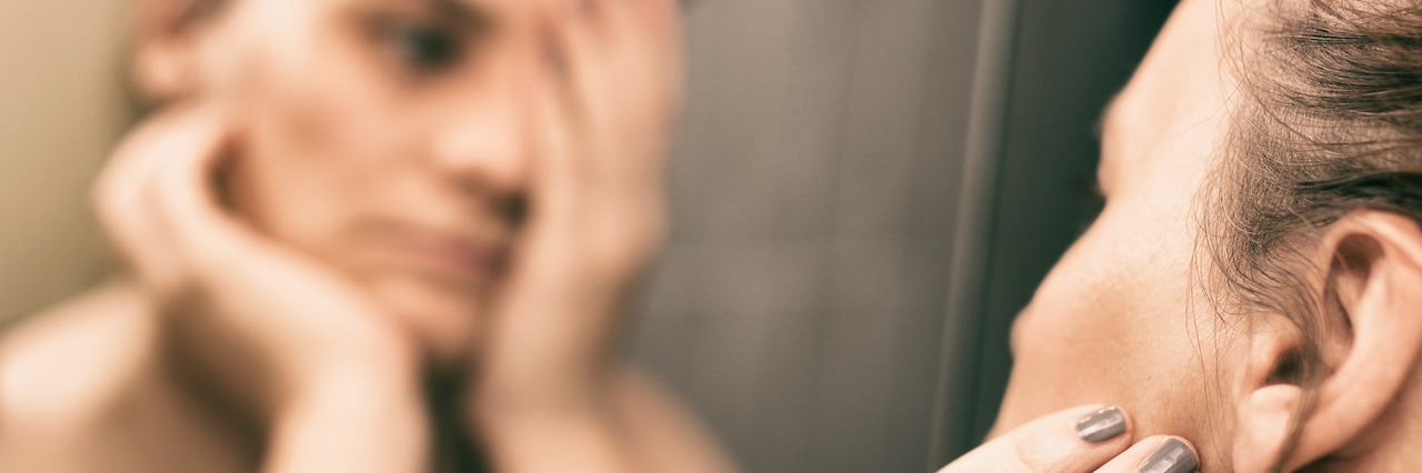 Learning to Rest During Eating Disorder Recovery Mirror reflection of depressed woman