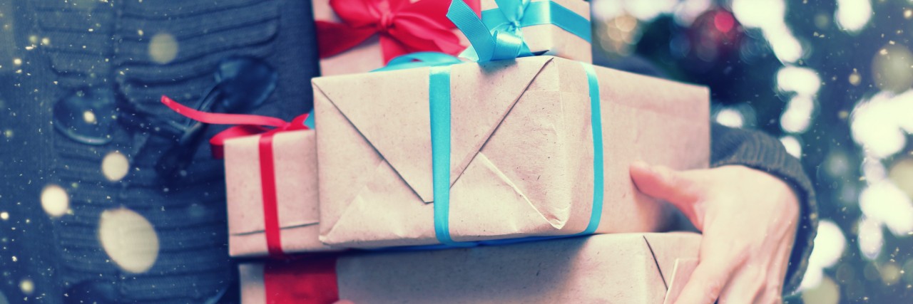 Controlling Spending Money During the Holidays With Bipolar Disorder stack of gifts for Christmas holidays