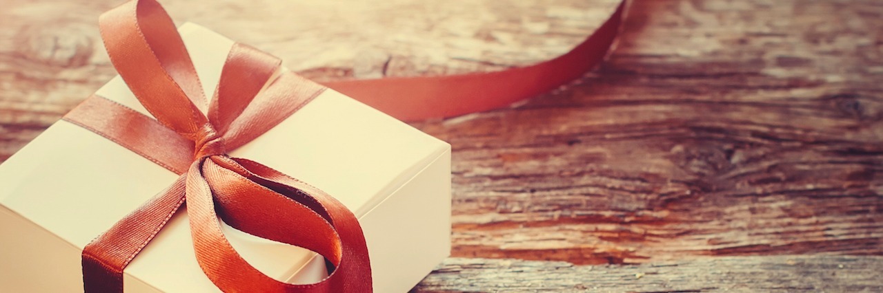 gift laying on wooden table