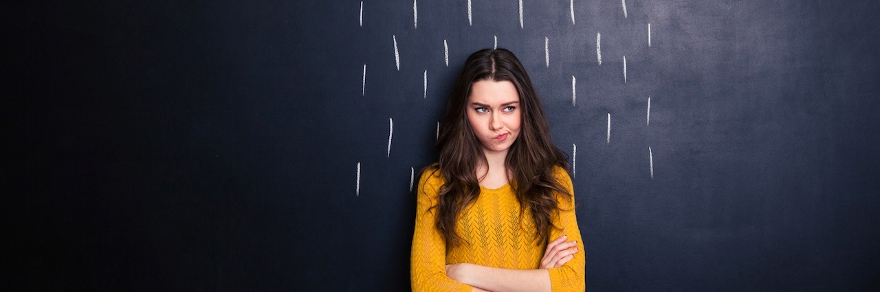 Why You Shouldn't Give Someone With Depression Unsolicited Advice Woman with a drawing of a rain cloud above her head