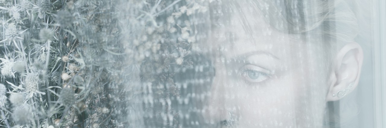 Borderline Personality and Thinking Everyone Hates Me Woman face behind transparent cloth