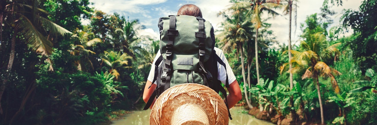 Living With Depression, Insomnia and Suicidal Thoughts Woman standing near big tropical river