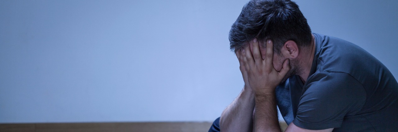 What to Say to Someone Who's Grieving Portrait of lonely depressed man
