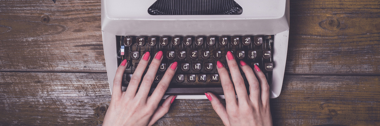 To the Person Considering Self-Harm Female hands writing on an old typewriter over wooden table