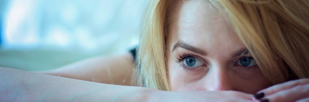 woman laying in bed