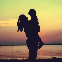 Silhouette of mother and daughter.