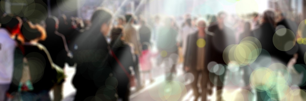 Anxiety: What It's Like Watching Someone Else's Panic Attack blurry background of people walking on a busy street