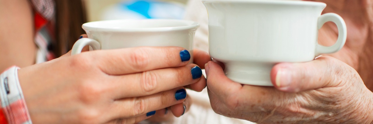 Why I Relate to Older People as a Young Woman With Health Problems Young and old women holding cups.