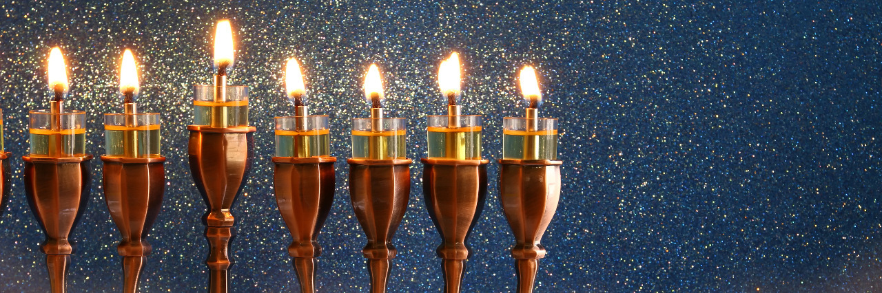 Celebrating Hanukkah as a Person With Cerebral Palsy Hanukkah menorah.