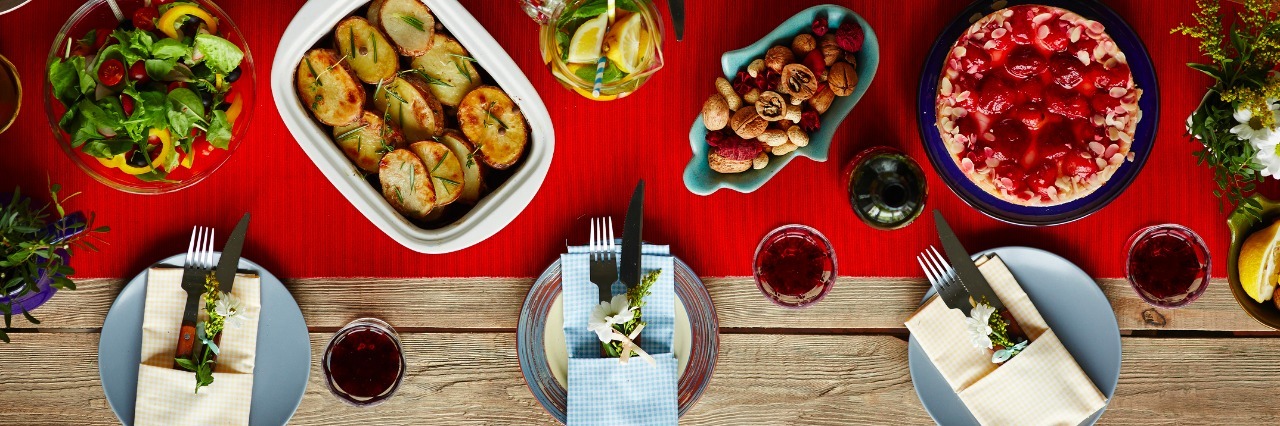 Christmas Time With Anorexia a table set with food and plates for christmas dinner