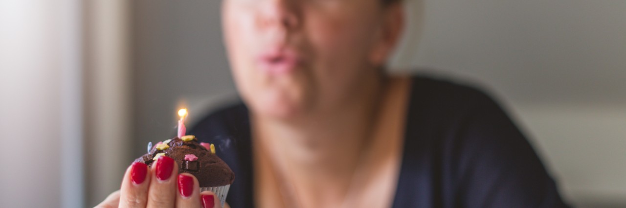 Depression, and What I'm Celebrating This Birthday happy woman celebrating her birthday