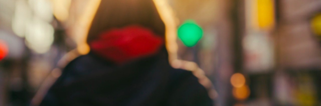 What People Need to Know When I'm Having a Meltdown Blurry photo of woman walking on city street