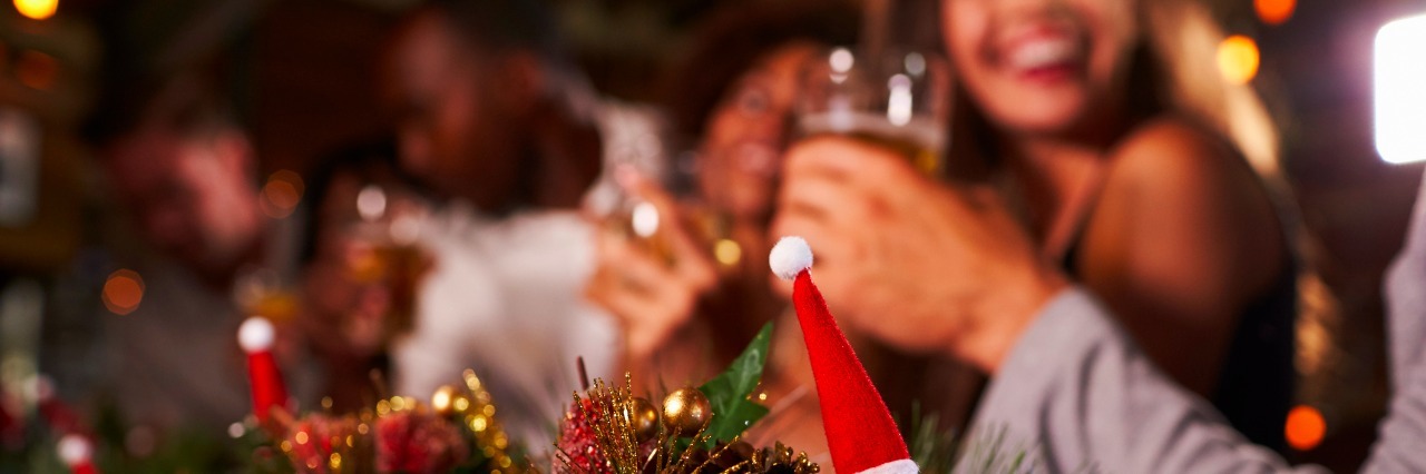Christmas party at a bar, focus on foreground decorations