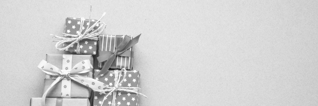 Gift Ideas for a Person With Major Depressive Disorder black and white pile of christmas gifts