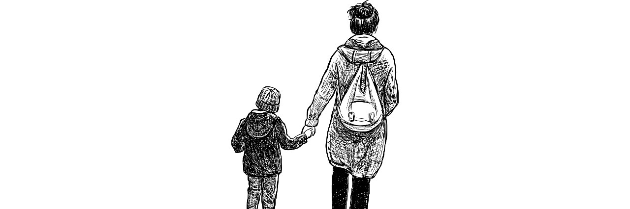 Mother walking with her son.