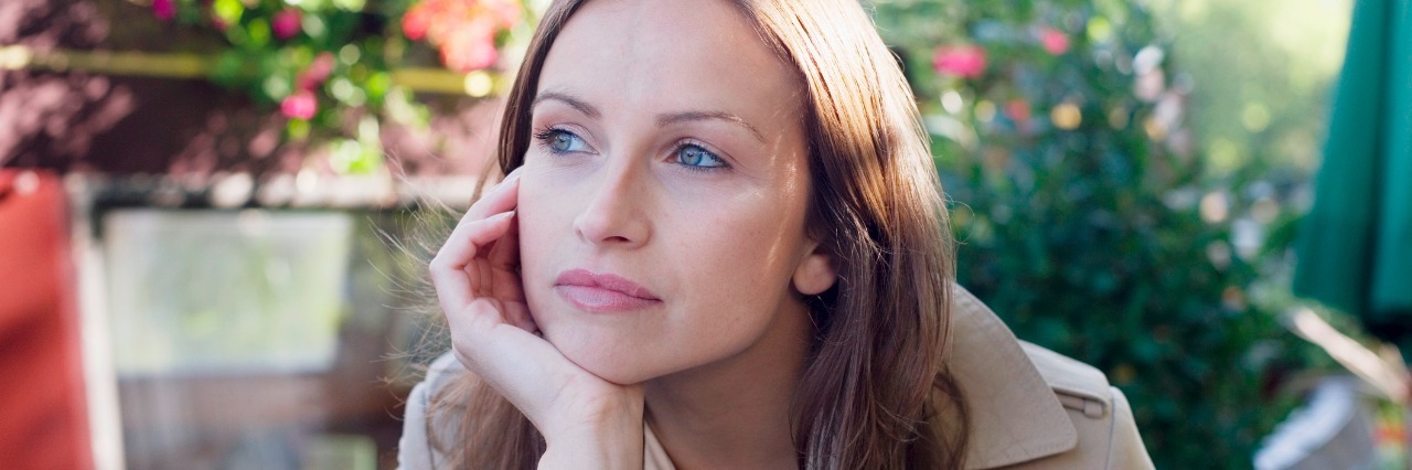 Nothing Is Wrong With You for Having Depression young woman sitting outside