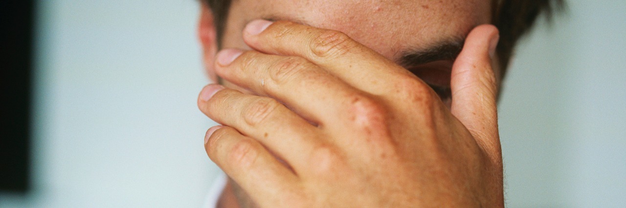 When You Feel Shame for Leaving Work for Depression and Anxiety man with his hands over his face