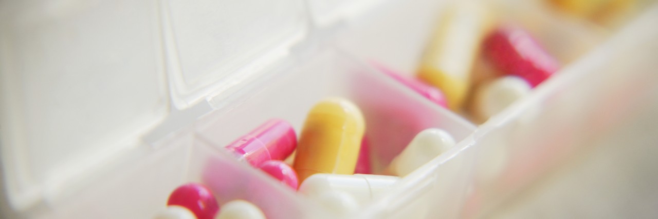 Deciding to Go On and Off My Anti-Anxiety Medication in College Pills in container