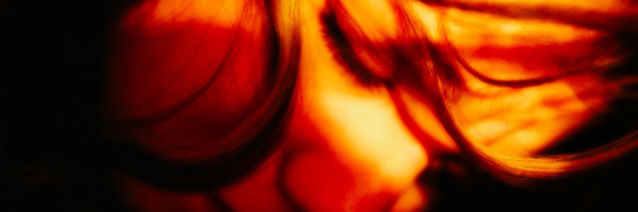 Mental Illness: Responding to 'You're Not Trying to Get Better' Woman with closed eyes