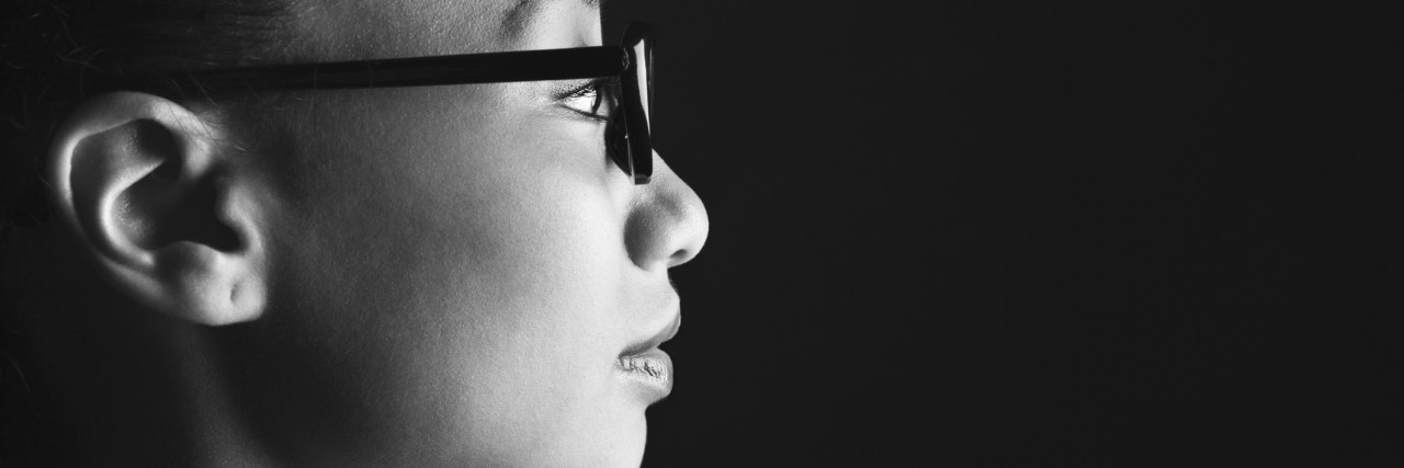 Profile of woman with eyeglasses